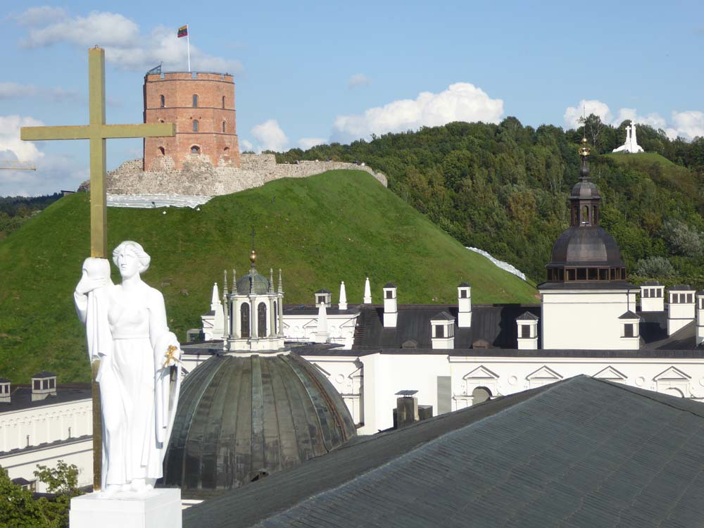 LITHUANIA - View across the cathedral roof to the castle and martyr site in Vilnius