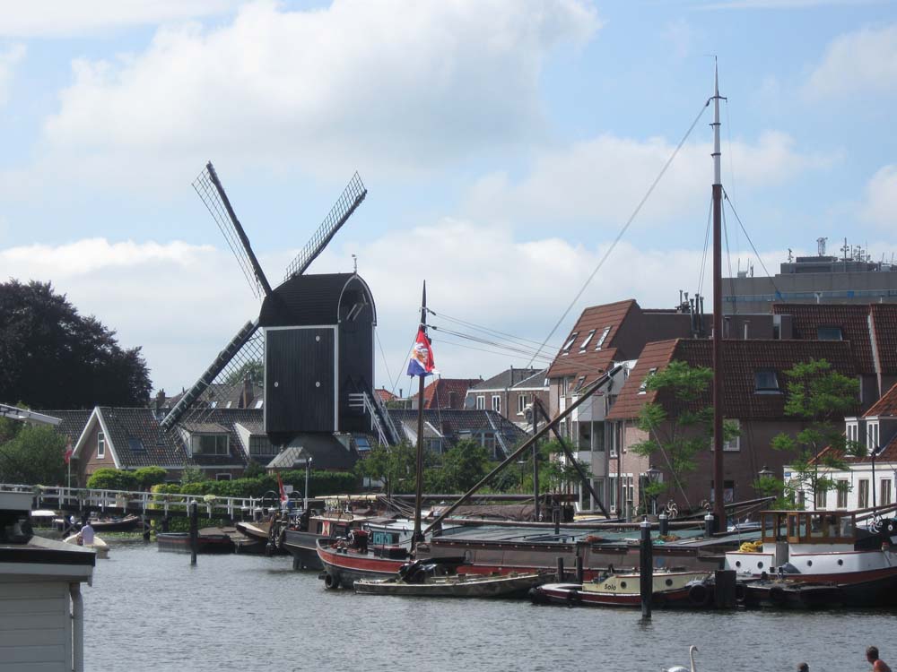 NETHERLANDS - Windmill on a canal in Leiden